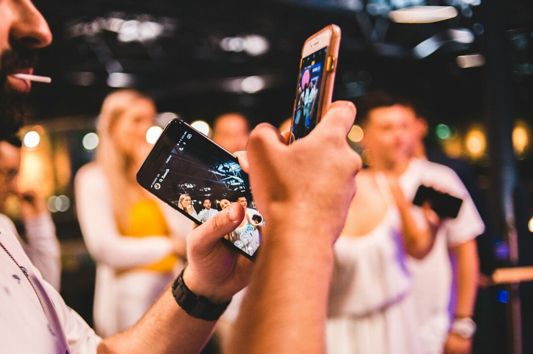 people scrolling on smartphones
