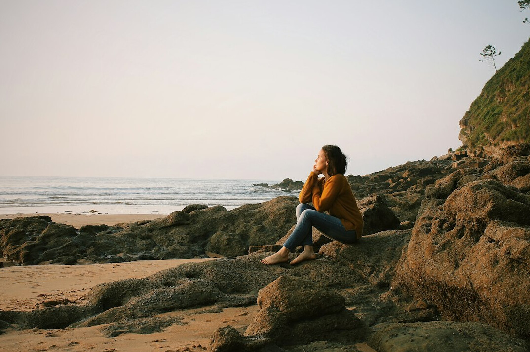 person thinking alone