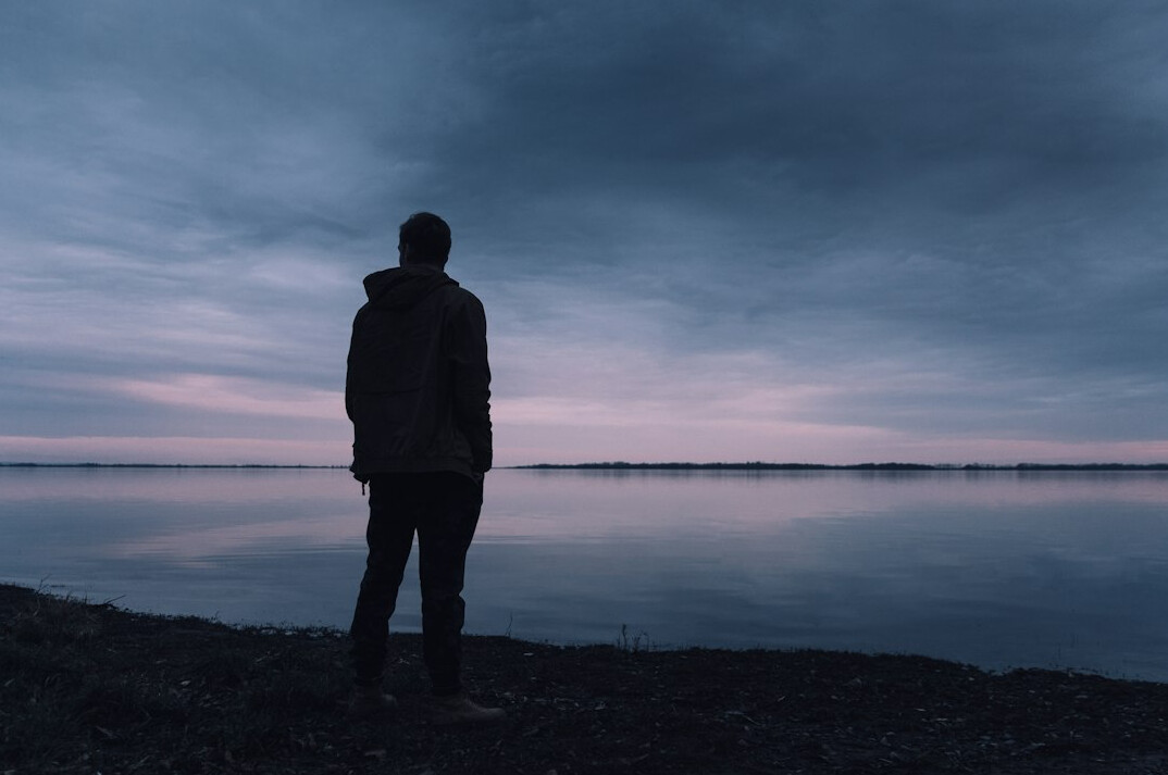 person thinking alone